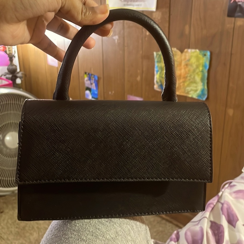 forever 21 brand black hand purse .